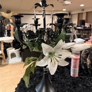 Elegant Black Candelabra with White Floral Accents